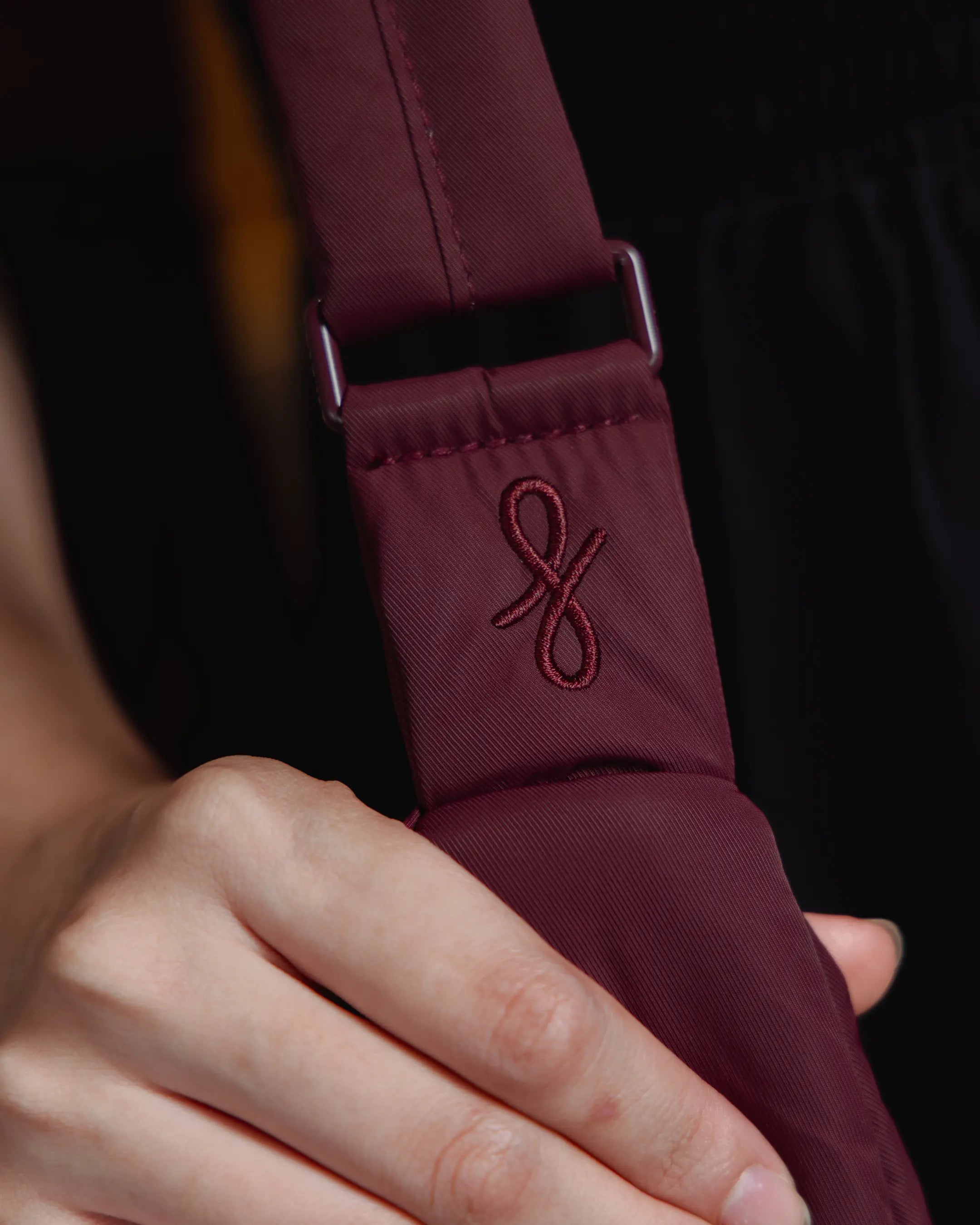 XL POSH CRESCENT BAG IN WINE TSL Singapore