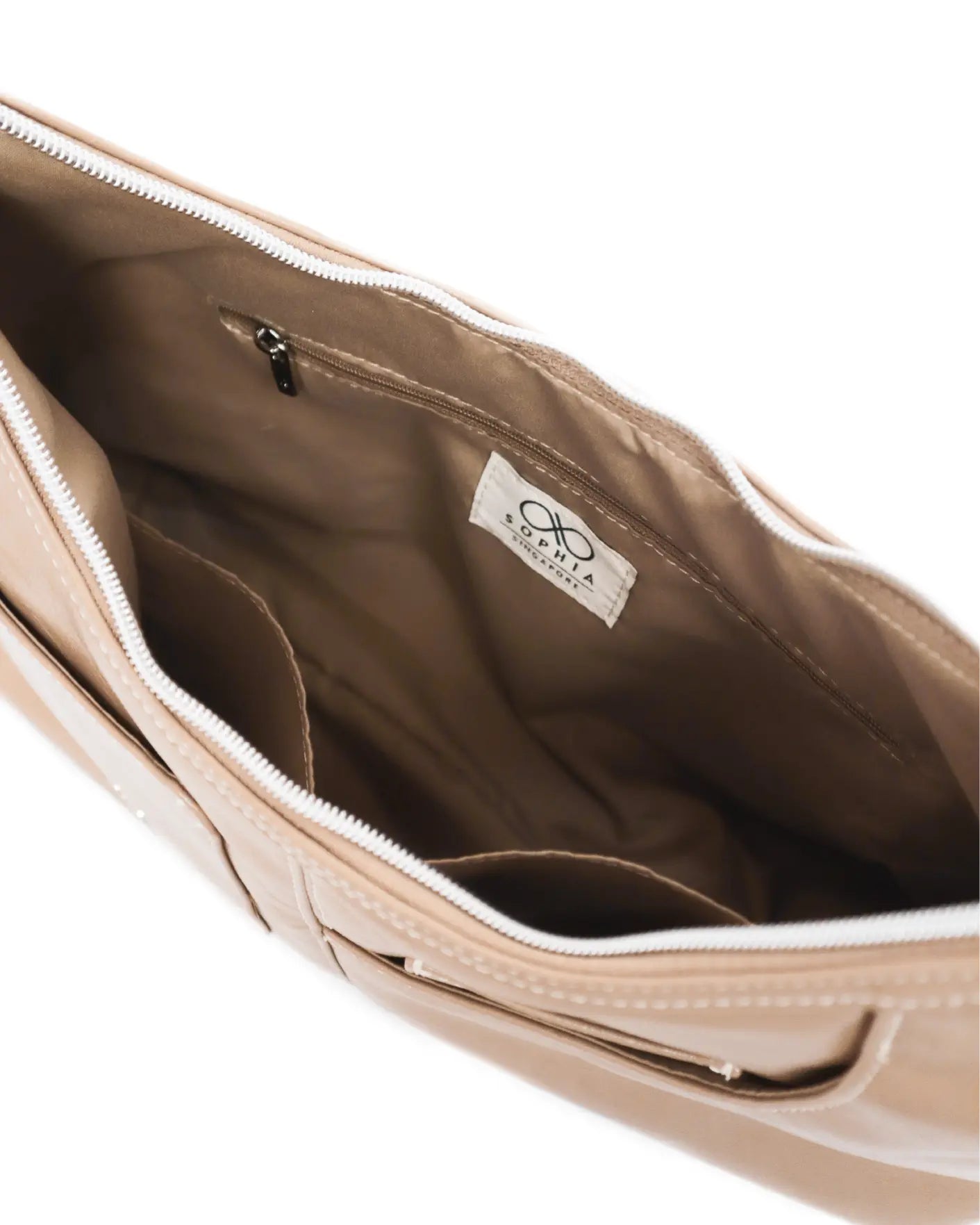 SIGNATURE POCKET LEATHER HOBO BAG IN MILK TEA TSL Singapore