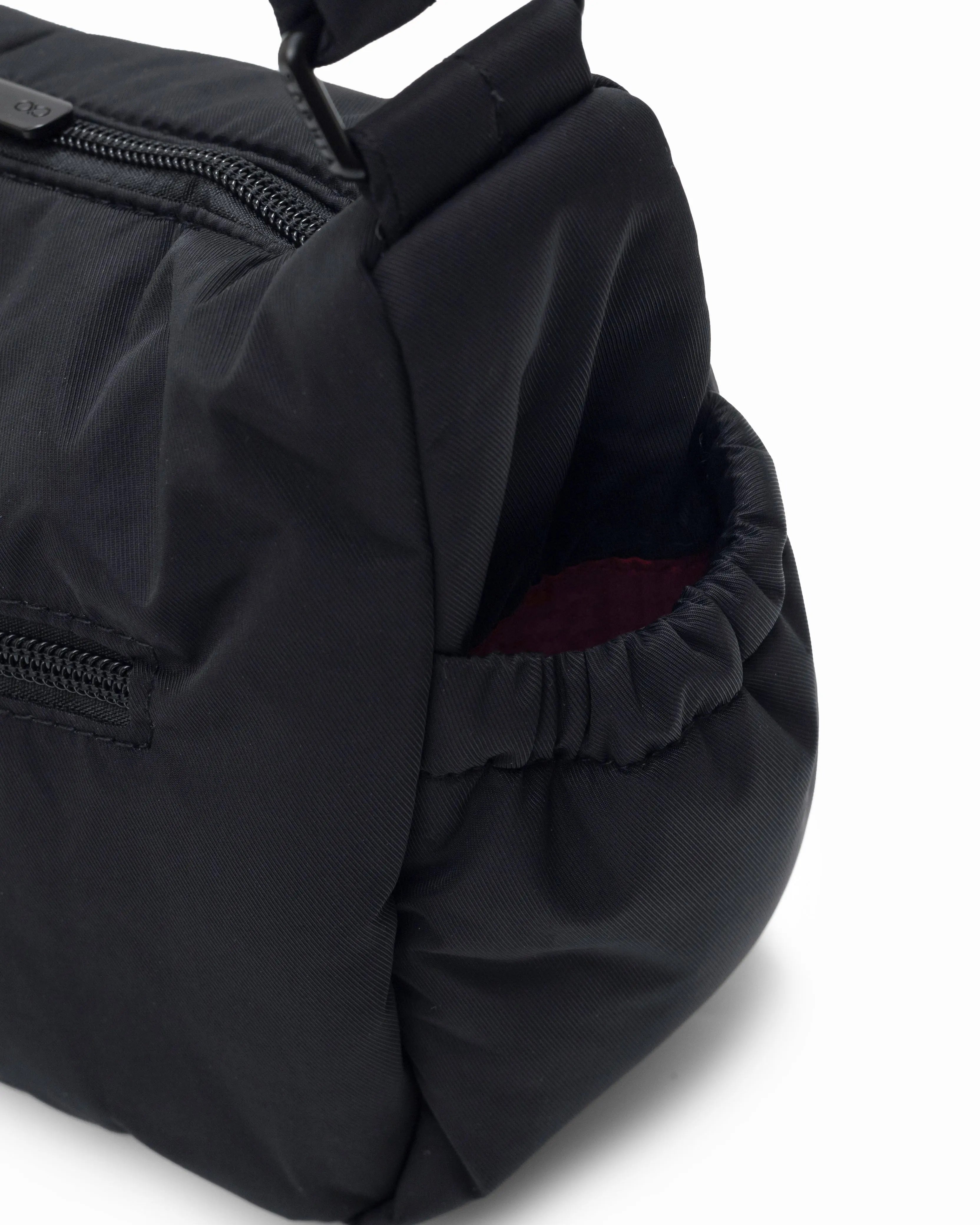 MINI SIGNATURE POCKET CROSSBODY BAG IN POSH JET BLACK
