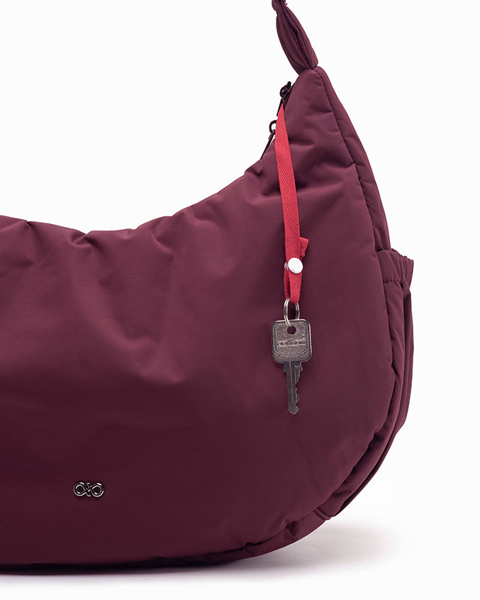 XL POSH CRESCENT BAG IN WINE