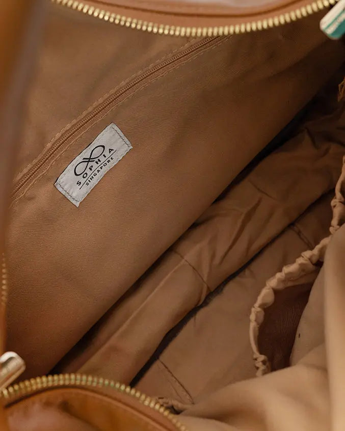 SIGNATURE POCKET SLOUCHY HOBO IN CAMEL TSL Singapore