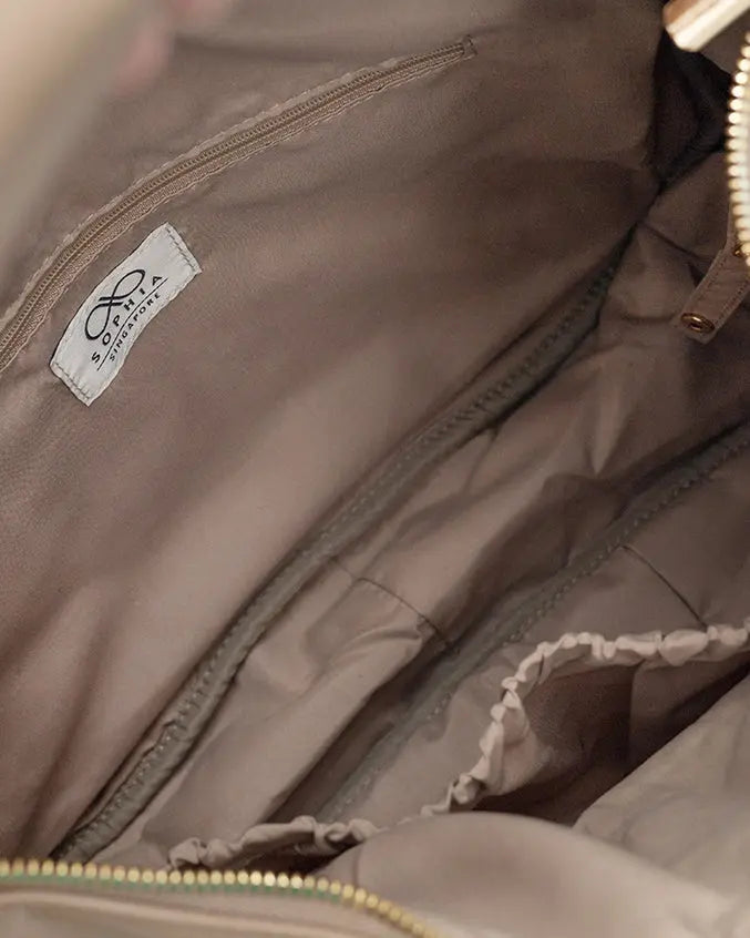 SIGNATURE POCKET SLOUCHY HOBO IN LATTE TSL Singapore