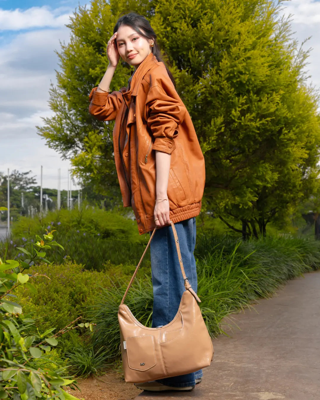 SIGNATURE POCKET LEATHER HOBO BAG IN MILK TEA TSL Singapore