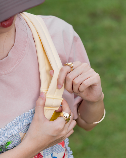 SIGNATURE POCKET CROSSBODY IN POSH MELLOW