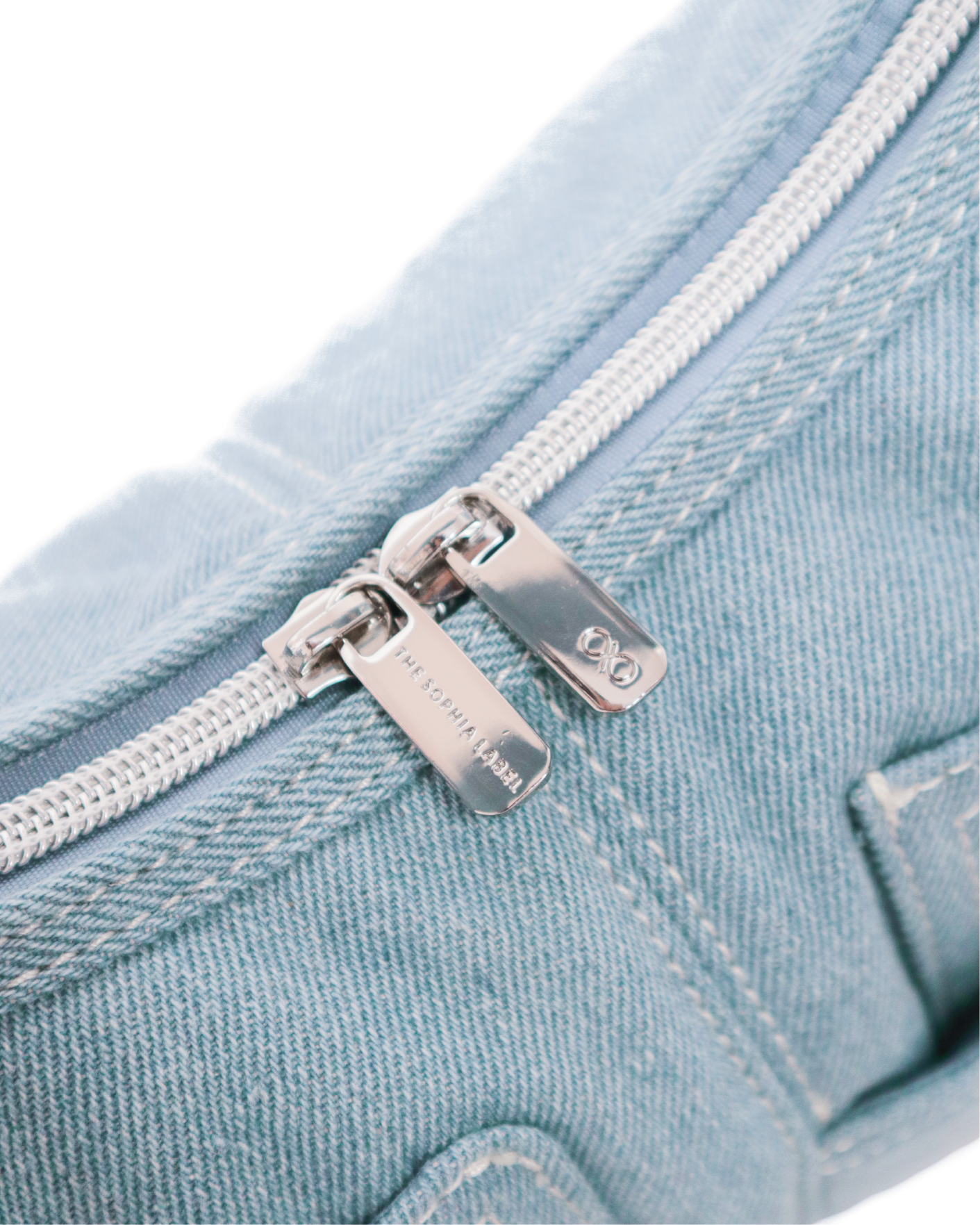 SIGNATURE POCKET HOBO BAG IN LIGHT WASH DENIM