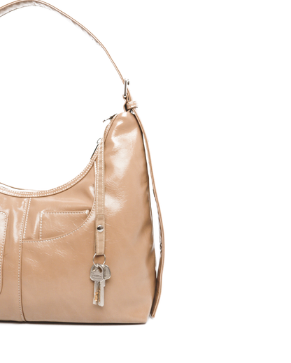 SIGNATURE POCKET LEATHER HOBO BAG IN MILK TEA