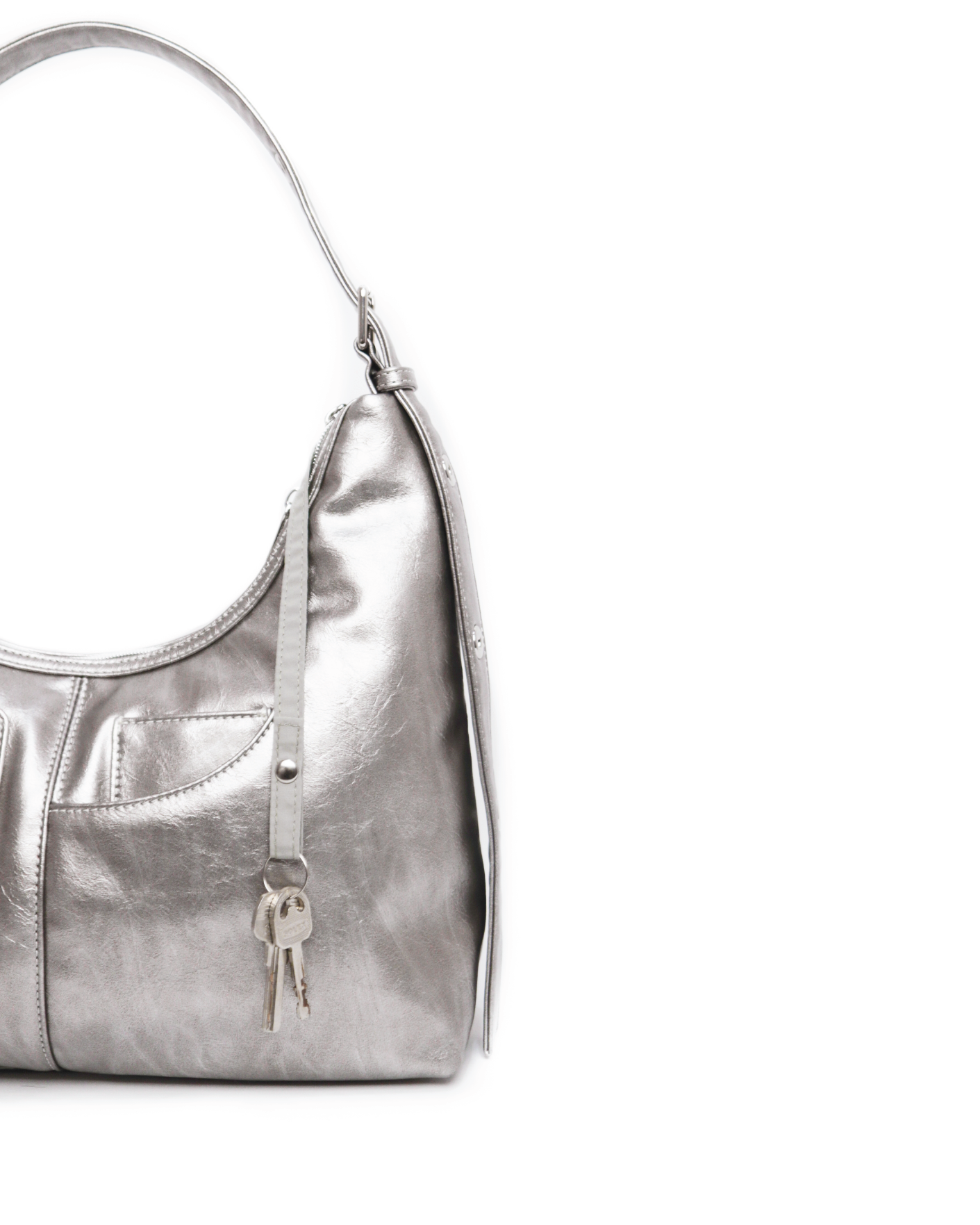 SIGNATURE POCKET LEATHER HOBO BAG IN NICKEL