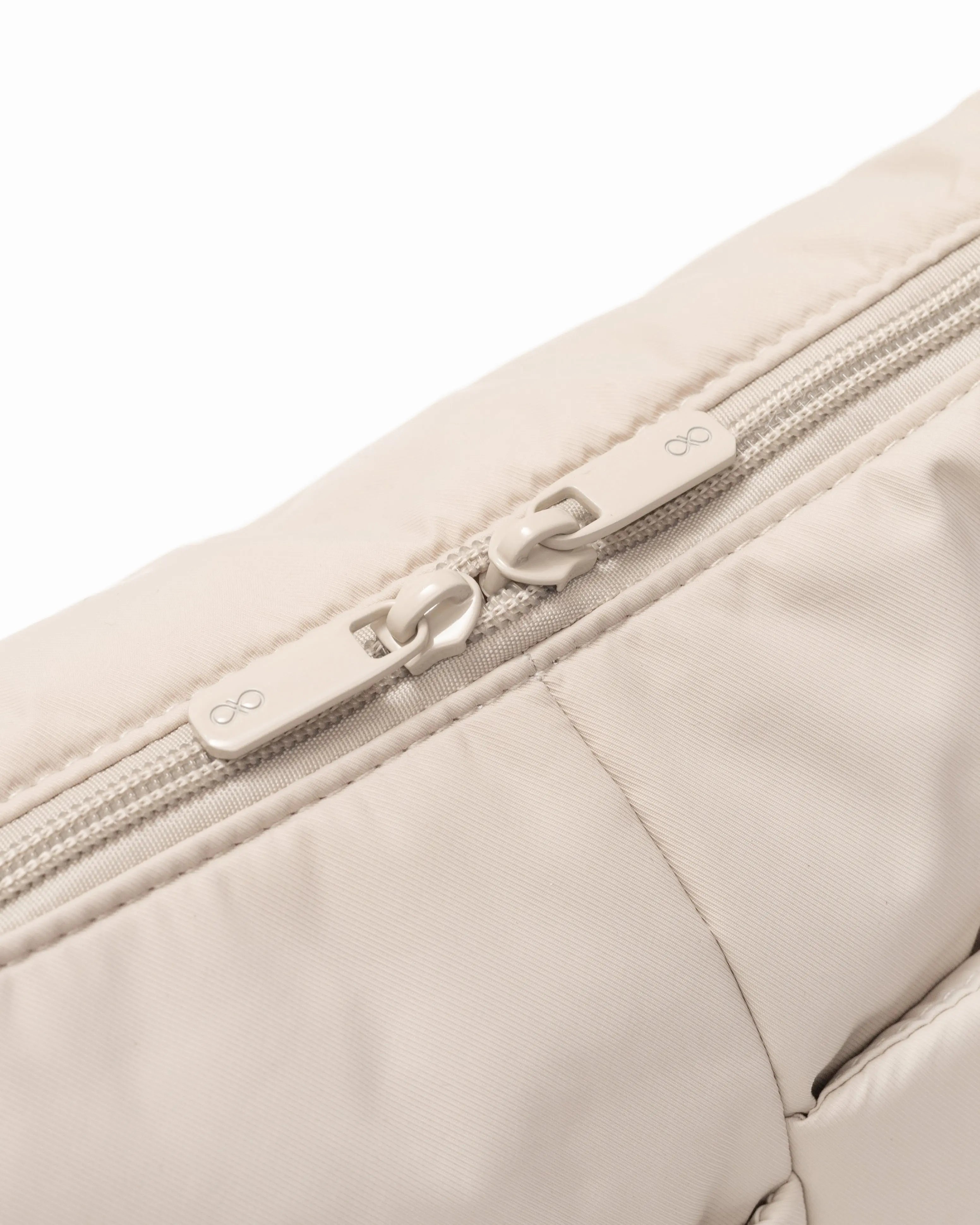 MINI SIGNATURE POCKET CROSSBODY BAG IN POSH OAT 