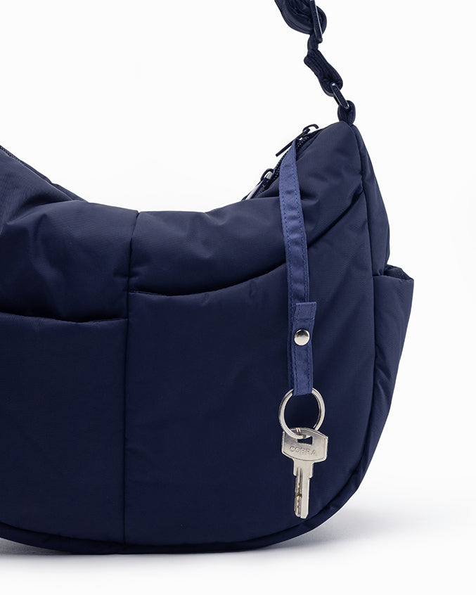 SIGNATURE POCKET CROSSBODY IN POSH MIDNIGHT