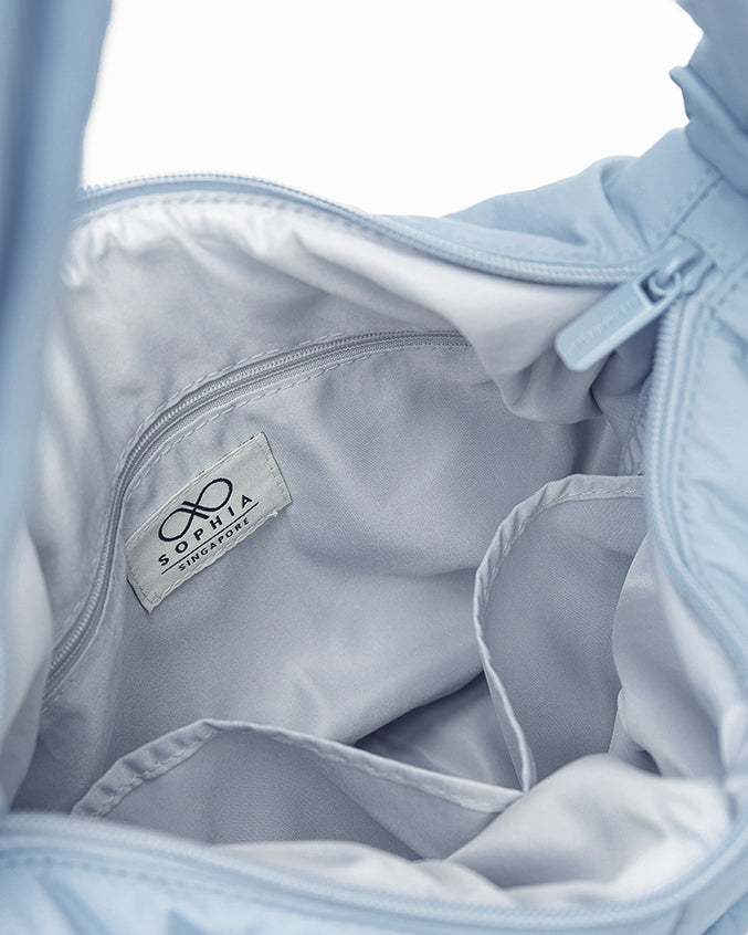 SIGNATURE POCKET CROSSBODY IN POSH MISTY