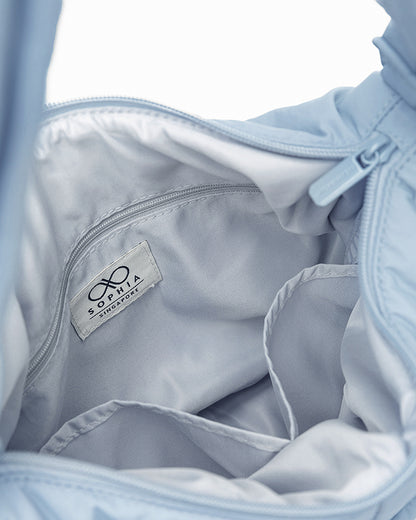 SIGNATURE POCKET CROSSBODY IN POSH MISTY