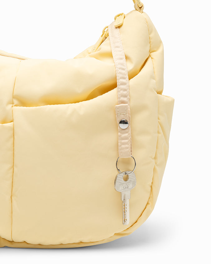 SIGNATURE POCKET CROSSBODY IN POSH MELLOW