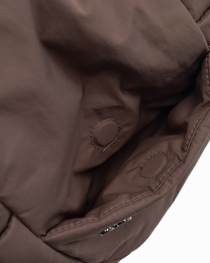 SIGNATURE POCKET CROSSBODY BAG IN POSH TAUPE