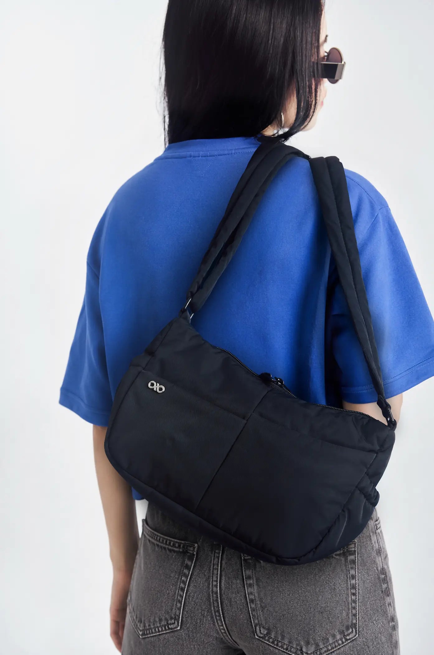 MINI SIGNATURE POCKET CROSSBODY BAG IN POSH JET BLACK 